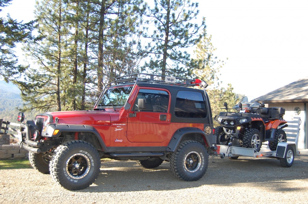 Jeep pulling Polaris Sportsman 850